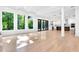 Bright and airy living area featuring large windows, hardwood floors, and an open concept at 801 Braselton Hwy, Lawrenceville, GA 30043
