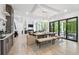 Open floor plan featuring dining area and living room with plenty of natural light at 801 Braselton Hwy, Lawrenceville, GA 30043
