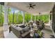 Relaxing covered porch with comfortable seating and ceiling fans at 801 Braselton Hwy, Lawrenceville, GA 30043