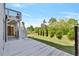Spacious backyard featuring a deck and lush greenery, perfect for outdoor activities at 1186 Lincoln Dr, Marietta, GA 30066