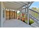 Relax in the backyard with a porch with corn hole boards and lovely landscaping at 1186 Lincoln Dr, Marietta, GA 30066