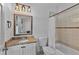 Bathroom featuring granite vanity, with shower and tub combo behind a shower curtain at 1186 Lincoln Dr, Marietta, GA 30066