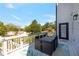 Relax on this deck with outdoor dining table and a view of the neighborhood at 1186 Lincoln Dr, Marietta, GA 30066