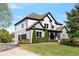 Well maintained home with attached garage, manicured landscaping, and a spacious front yard at 1186 Lincoln Dr, Marietta, GA 30066