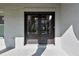 Elegant double front doors offer a glimpse into the welcoming interior of this beautiful home at 1186 Lincoln Dr, Marietta, GA 30066