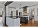 Stylish kitchen with custom cabinetry, granite countertops, stainless steel appliances, and island with sink at 1186 Lincoln Dr, Marietta, GA 30066