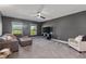 Spacious living room featuring large windows for ample light, neutral paint colors, and plush carpet at 1186 Lincoln Dr, Marietta, GA 30066