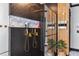 A modern shower boasts black herringbone tile, gold hardware and an inset marble shelving nook at 1186 Lincoln Dr, Marietta, GA 30066