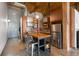 Compact kitchen area with stainless steel appliances, butcher block island, and stylish mosaic tile backsplash at 170 Boulevard Se # H405, Atlanta, GA 30312