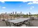 Spacious rooftop deck offering panoramic city skyline views at 170 Boulevard Se # H405, Atlanta, GA 30312