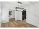 Dining area featuring hardwood floors, modern lighting, and an open layout at 4581 Hickory Run Nw Ct, Acworth, GA 30102