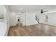 Spacious living room with hardwood floors, neutral paint, and natural light from windows at 4581 Hickory Run Nw Ct, Acworth, GA 30102