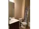 Cozy bathroom features a shower-tub combo, neutral tile floors and a large vanity at 1186 Ridenour Blvd # 5, Kennesaw, GA 30152