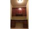 Home office features desk with cabinets for storage at 1186 Ridenour Blvd # 5, Kennesaw, GA 30152
