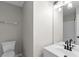Bathroom featuring a toilet, granite countertops, and modern lighting at 191 Misty Ridge Trl, Stockbridge, GA 30281