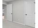 Bedroom featuring a white door with carpet flooring and neutral paint at 191 Misty Ridge Trl, Stockbridge, GA 30281