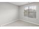 Bright bedroom featuring carpet and large window letting in natural light at 191 Misty Ridge Trl, Stockbridge, GA 30281