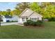 Attractive single-story home with a well-manicured lawn and mature trees at 191 Misty Ridge Trl, Stockbridge, GA 30281
