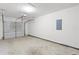 Spacious garage with concrete flooring and automatic door at 191 Misty Ridge Trl, Stockbridge, GA 30281