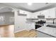 Updated kitchen with granite countertops, sleek stainless steel appliances, and ample cabinet space at 191 Misty Ridge Trl, Stockbridge, GA 30281