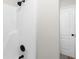 Clean shower area with a rainfall shower head and sleek fixtures for a refreshing experience at 191 Misty Ridge Trl, Stockbridge, GA 30281