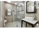 Modern bathroom with glass shower, vessel sink, and contemporary fixtures and gray tile at 3311 Stillhouse Se Rd, Atlanta, GA 30339
