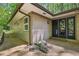 Stylish exterior featuring a brick facade, modern windows, and well-maintained grounds enhance curb appeal at 3311 Stillhouse Se Rd, Atlanta, GA 30339