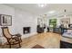 Bright office space with a marble fireplace, wood floors, and large windows at 3311 Stillhouse Se Rd, Atlanta, GA 30339