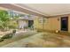 Covered patio with neutral brick and forest surroundings at 3311 Stillhouse Se Rd, Atlanta, GA 30339