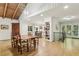 Open floor plan to kitchen, dining room and doors to outside at 3311 Stillhouse Se Rd, Atlanta, GA 30339