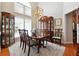 Dining area showcasing the furniture and decor in a naturally lit space with high ceilings at 5832 Sloane St, Douglasville, GA 30135