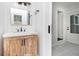 Bright bathroom features a modern vanity and fixtures, with a plank-style flooring at 3423 Rugby Cir, Atlanta, GA 30337