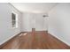 Neutral bedroom with hardwood floors, a window and closet at 3423 Rugby Cir, Atlanta, GA 30337