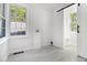 Bright laundry room features lots of natural light and plank-style flooring at 3423 Rugby Cir, Atlanta, GA 30337