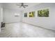 Bright living room has lots of natural light and wood-style flooring at 3423 Rugby Cir, Atlanta, GA 30337