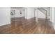 Open floor plan featuring hardwood flooring and access to other rooms in the house at 3423 Rugby Cir, Atlanta, GA 30337