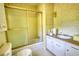 Cozy bathroom features a shower/tub combo with a sliding door and a single sink at 2520 Overlook Ne Way, Atlanta, GA 30345