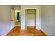 Bedroom featuring hardwood floors, closet, and neutral walls at 2520 Overlook Ne Way, Atlanta, GA 30345