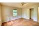 Bedroom with hardwood floors, ceiling fan, closet and a window at 2520 Overlook Ne Way, Atlanta, GA 30345