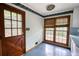 Cozy breakfast nook features a wood door, windows and colorful accent lighting at 2520 Overlook Ne Way, Atlanta, GA 30345