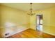 Classic dining room with hardwood floors and elegant chandelier lighting, perfect for hosting dinner parties at 2520 Overlook Ne Way, Atlanta, GA 30345
