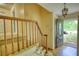 Inviting foyer area featuring hardwood flooring, staircase, and natural light at 2520 Overlook Ne Way, Atlanta, GA 30345