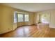 Bright living room with hardwood floors, bay window, and open floor plan for easy entertaining at 2520 Overlook Ne Way, Atlanta, GA 30345