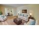 Bright living room with hardwood floors, comfortable seating, and a glimpse of the dining room at 2520 Overlook Ne Way, Atlanta, GA 30345