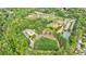 Aerial view of community recreational facilities featuring sports fields and tennis courts at 3250 Twisted Branches Ln, Marietta, GA 30068