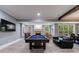 Finished basement with pool table, fireplace, tv, and comfortable seating at 3250 Twisted Branches Ln, Marietta, GA 30068