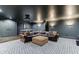 Entertainment room with projector, large leather sofa, pool table, and neutral toned decor at 3250 Twisted Branches Ln, Marietta, GA 30068