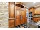 Gourmet kitchen featuring custom wood cabinets, stone accents, and stainless steel appliances at 3250 Twisted Branches Ln, Marietta, GA 30068