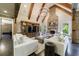 Inviting living space featuring stone accents, a fireplace, and comfortable seating perfect for entertaining at 3250 Twisted Branches Ln, Marietta, GA 30068
