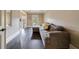 Living room with dark hard wood floors, comfortable sofa, and a window view at 3250 Twisted Branches Ln, Marietta, GA 30068